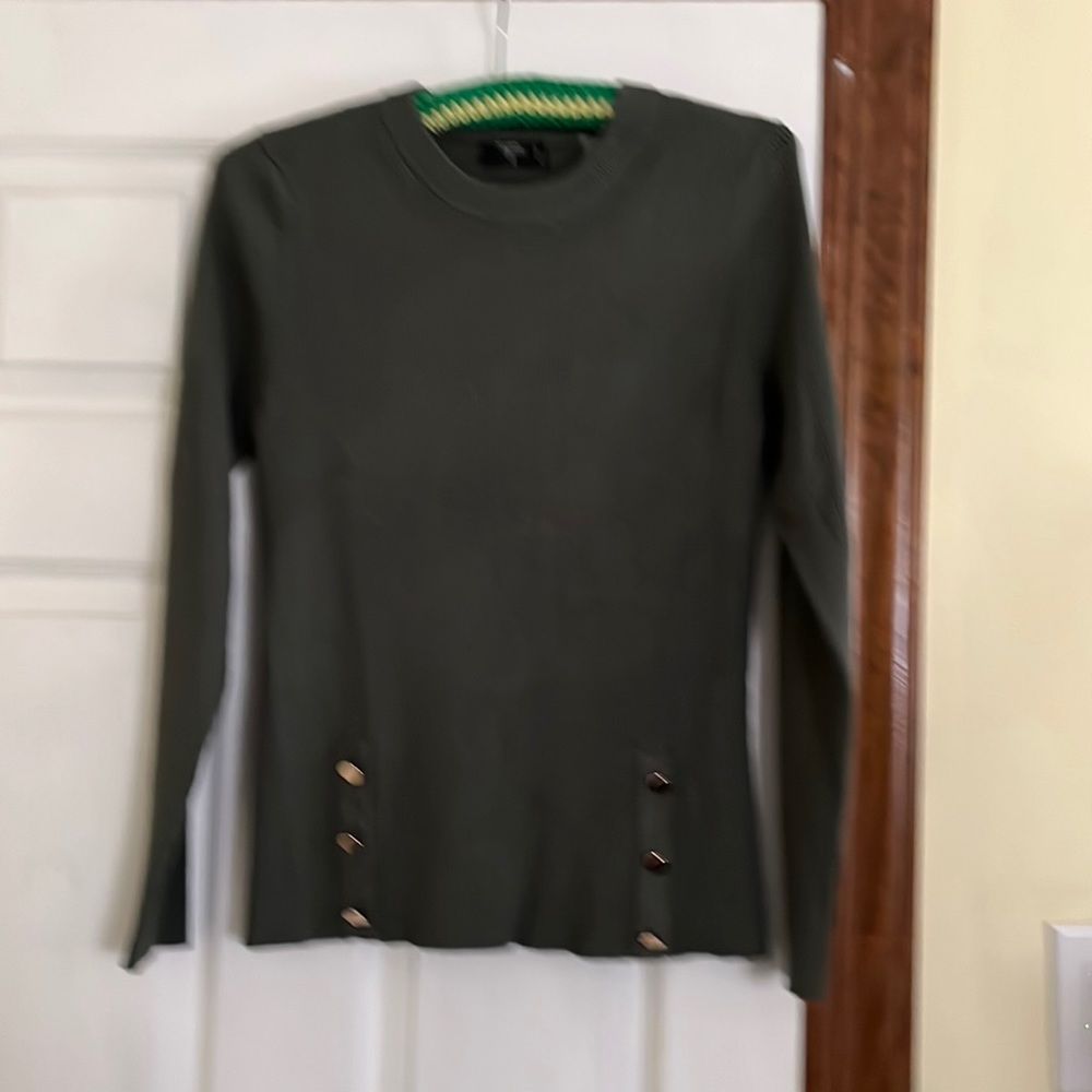 Tahari olive green sweater with button detail at the bottom